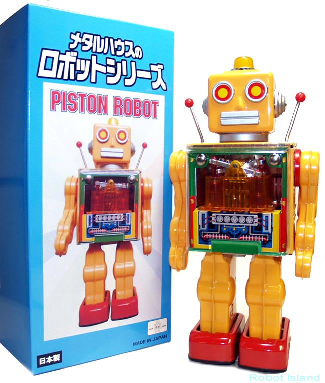 Piston Robot Japan Metal House Battery Operated Tin Toy Yellow
